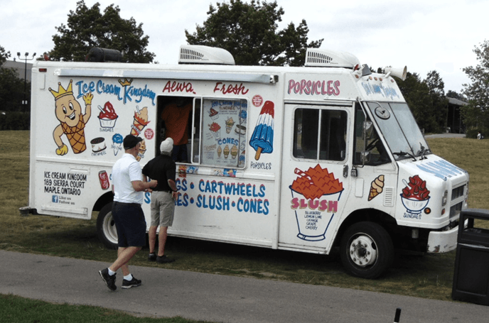 Ice Cream Truck Toronto serving a crowd, available for bookings in Oshawa